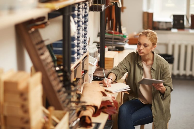 woman sat in her workshop