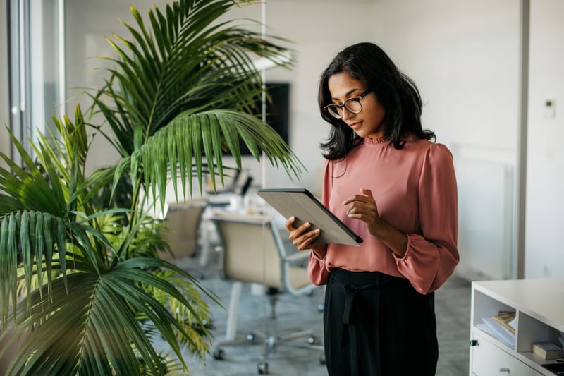 businesswoman looking at her tablet
