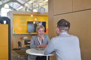 HR laughing with employee